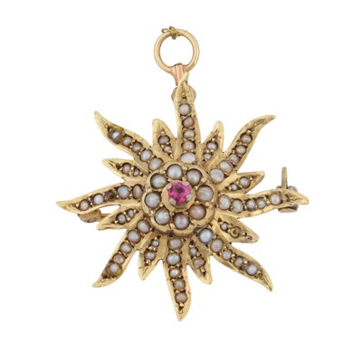 Lot 161 - A ruby and seed pearl brooch / pendant