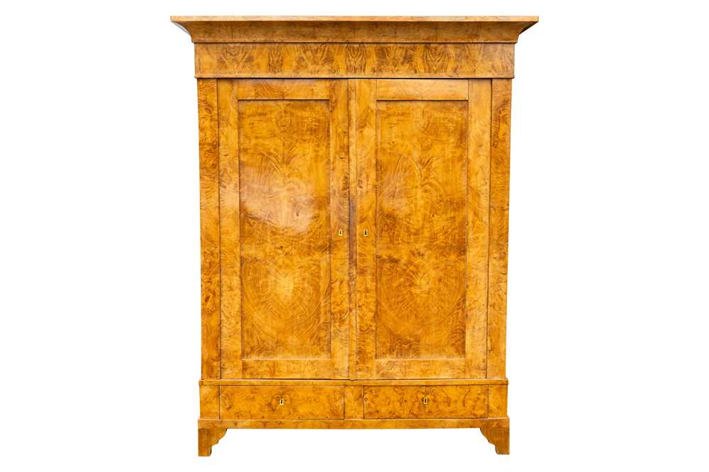 Lot 32 - A German Biedermeier ash armoire, Magdeburg, circa 1825