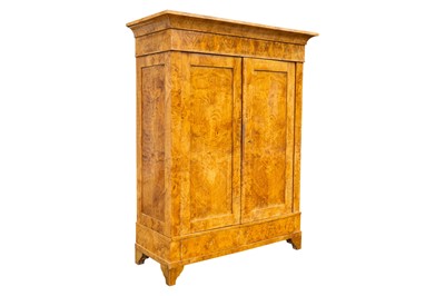 Lot 32 - A German Biedermeier ash armoire, Magdeburg, circa 1825