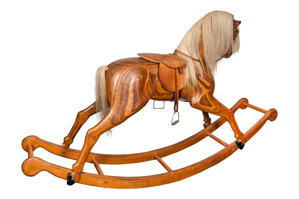 Lot 435 - A Relko laminated wood child's rocking horse