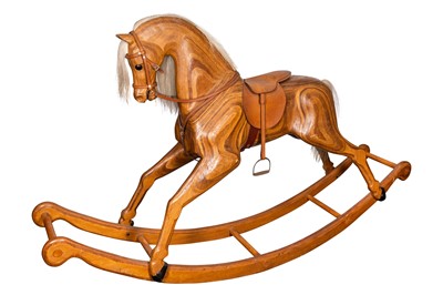 Lot 435 - A Relko laminated wood child's rocking horse