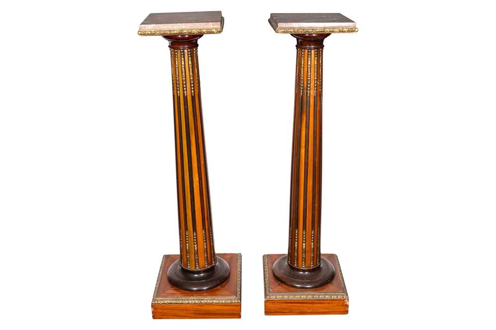 Lot 48 - A pair of French Empire style fruitwood, mahogany, and ebonised pedestals