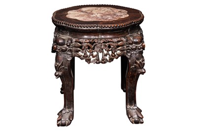 Lot 373 - A Qing Dynasty Chinese rosewood jardiniere stand