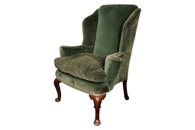 Lot 327 - A wing back armchair