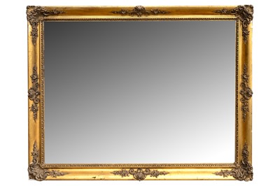 Lot 512 - A large French giltwood and gesso rectangular gilt mirror