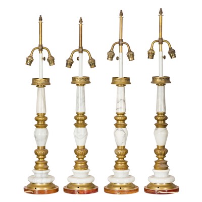 Lot 259 - A set of four green marble and brass table lamps