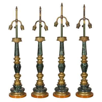 Lot 260 - A set of four green marble and brass table lamps
