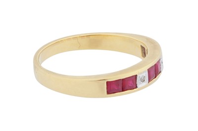 Lot 121 - A ruby and diamond band