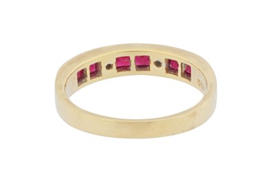 Lot 121 - A ruby and diamond band