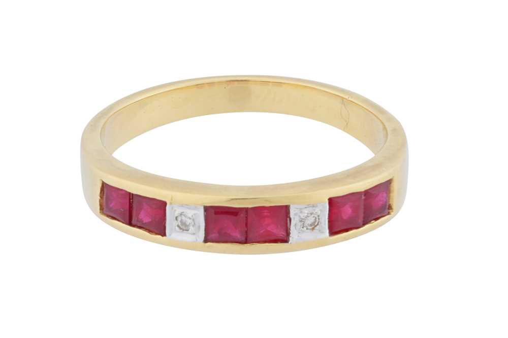 Lot 121 - A ruby and diamond band