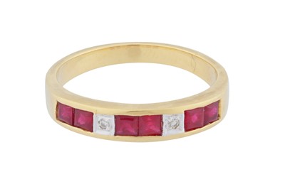 Lot 121 - A ruby and diamond band