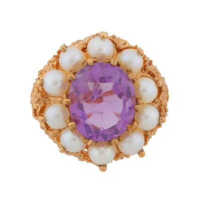 Lot 154 - An amethyst and pearl dress ring