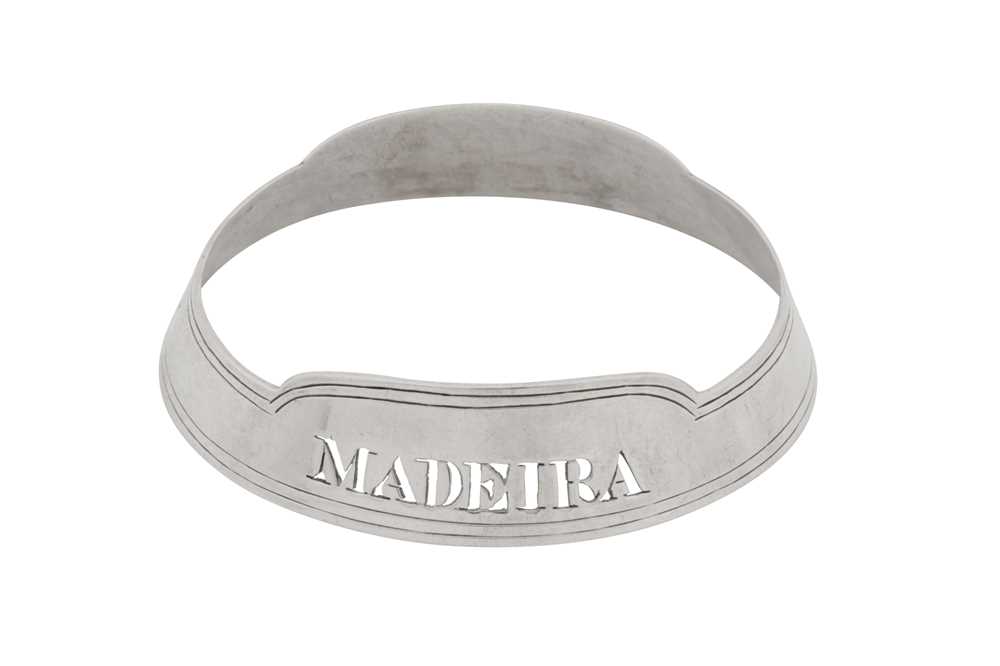 Lot 33 - A Victorian sterling silver wine label bottle collar, London 1866 by Henry John Lias