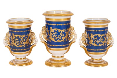 Lot 24 - A garniture of three Paris porcelain spill vases