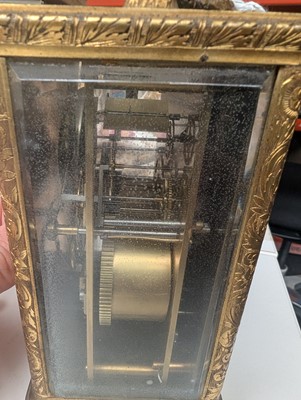 Lot 105 - A.B. Savory and Sons, a calendar and alarm carriage clock