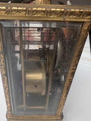 Lot 105 - A.B. Savory and Sons, a calendar and alarm carriage clock