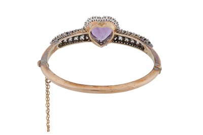 Lot 19 - An amethyst and diamond bangle