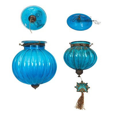 Lot 242 - A graduated pair of blue glass ceiling light pendants