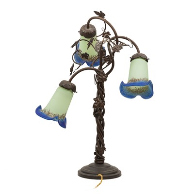 Lot 268 - A French Art Nouveau Style Wrought Iron and Glass Table Lamp