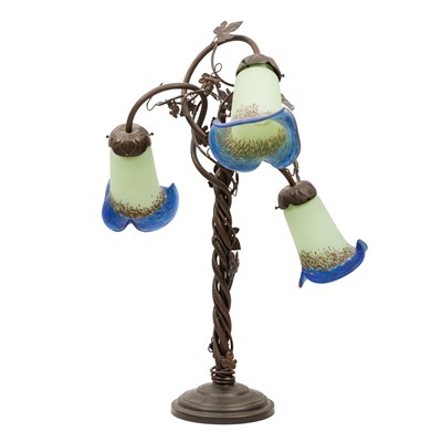 Lot 268 - A French Art Nouveau Style Wrought Iron and Glass Table Lamp