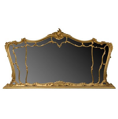 Lot 513 - A Rococo style giltwood overmantel mirror