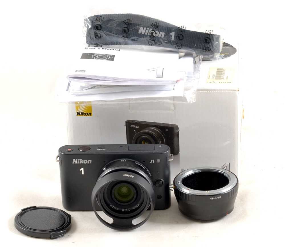 Lot 304 - Black Nikon J1 Mirrorless Digital Compact Camera.