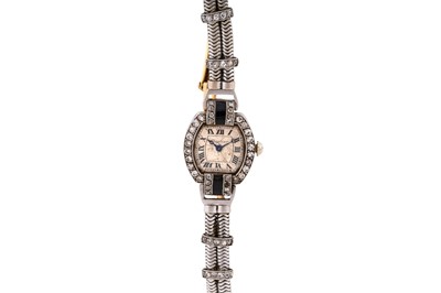 Lot 441 - Cartier - Rare Art Deco 18k Gold, Platinum and Diamond-Set Cocktail Watch