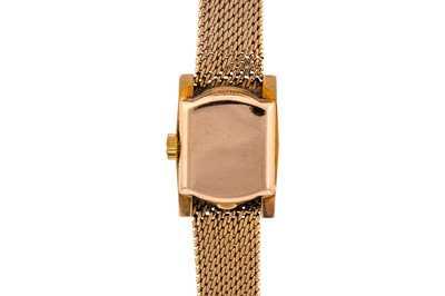 Lot 446 - Lady's Omega 18k Gold Bracelet Watch