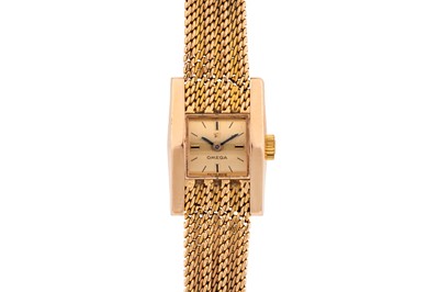 Lot 446 - Lady's Omega 18k Gold Bracelet Watch