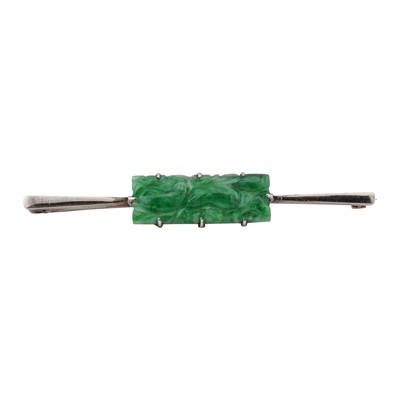 Lot 348 - A carved jade brooch