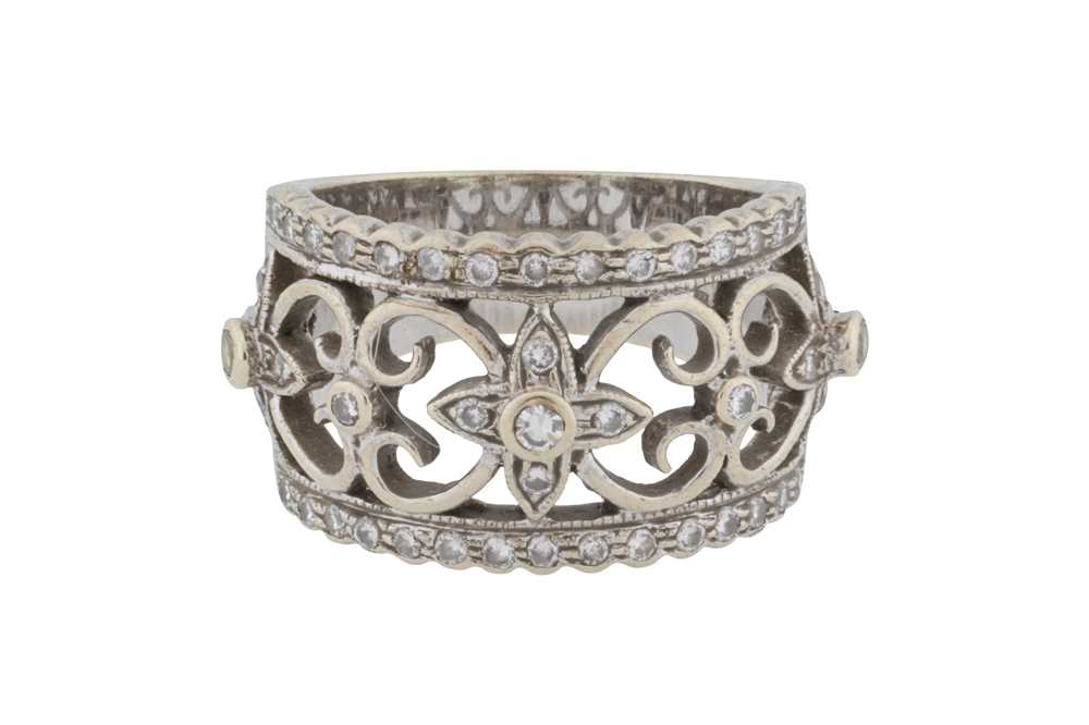 Lot 143 - A diamond and sapphire ring, circa 2005