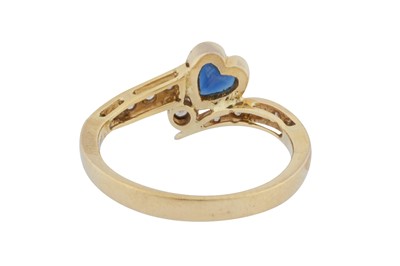 Lot 59 - A sapphire and diamond heart ring