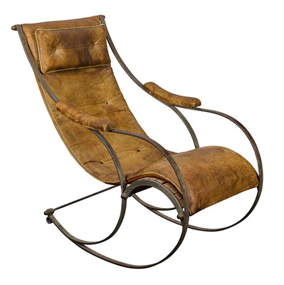 Lot 329 - A rocking chair by Peter Cooper for R.W. Winfield & co., Birmingham, England, circa 1890