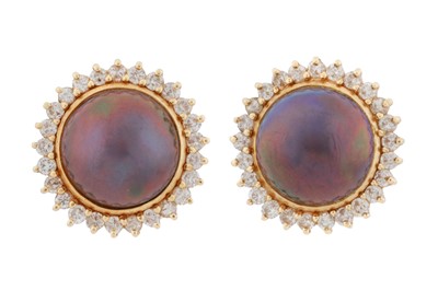Lot 180 - A pair of mabé pearl and diamond earrings, circa 1956