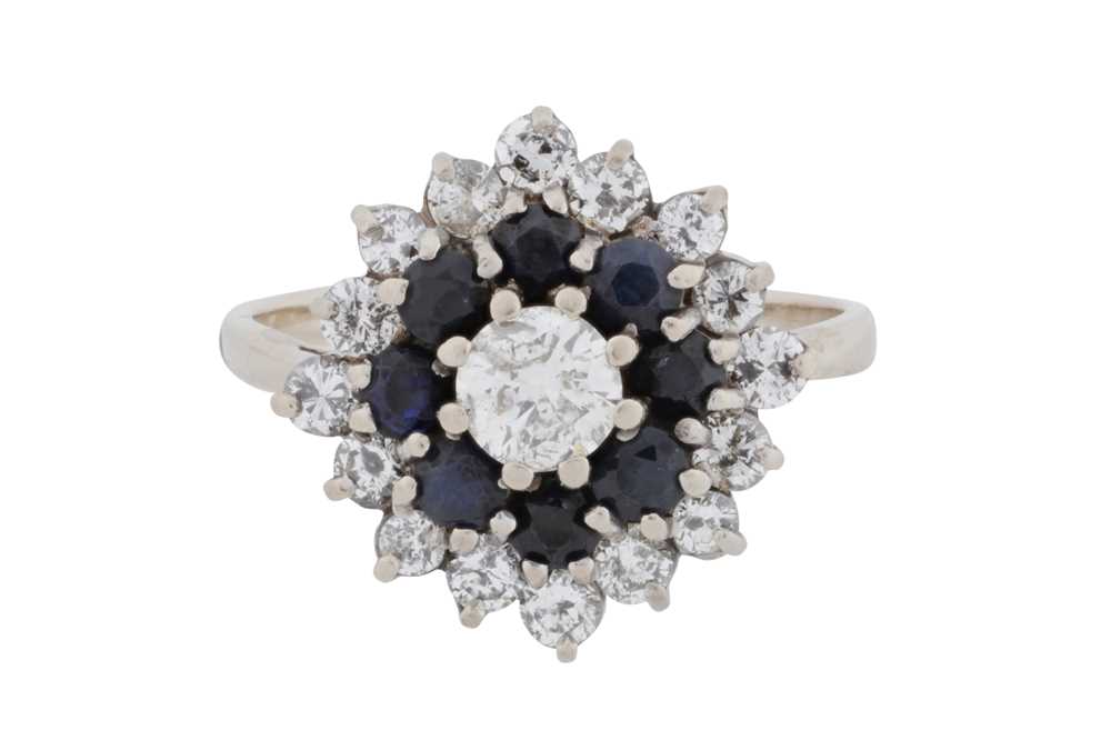 Lot 65 - A diamond and sapphire ring