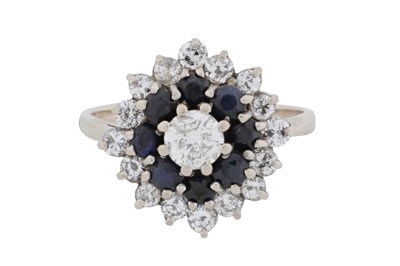 Lot 65 - A diamond and sapphire ring