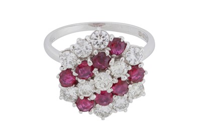 Lot 135 - A ruby and diamond ring, circa 1975