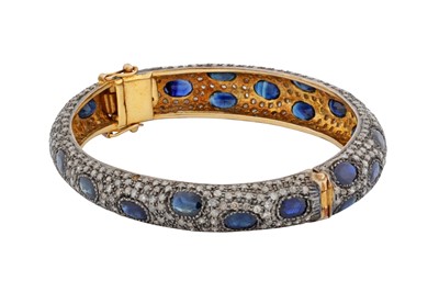 Lot 77 - Amrapali Ι A sapphire and diamond bangle, circa 2014