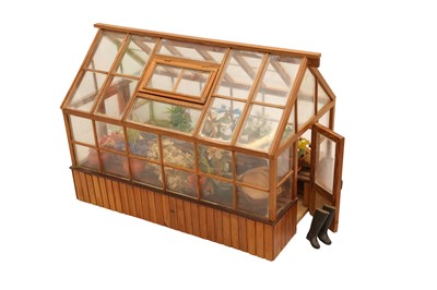 Lot 436 - A miniature greenhouse