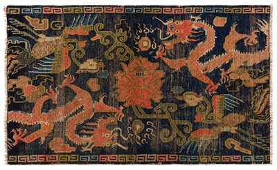Lot 18 - An antique Tibetan rug, approx: 152cm. x 92cm