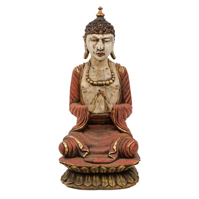 Lot 376 - A polychrome painted carved wooden figure of a seated Buddha, late 19th / early 20th century
