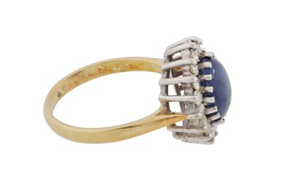 Lot 61 - A sapphire and diamond cluster ring, circa 1988