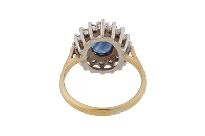 Lot 61 - A sapphire and diamond cluster ring, circa 1988