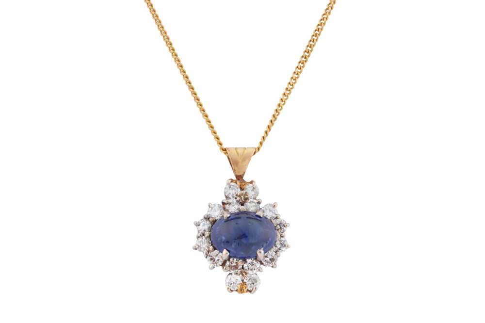 Lot 60 - A sapphire and diamond cluster pendant necklace