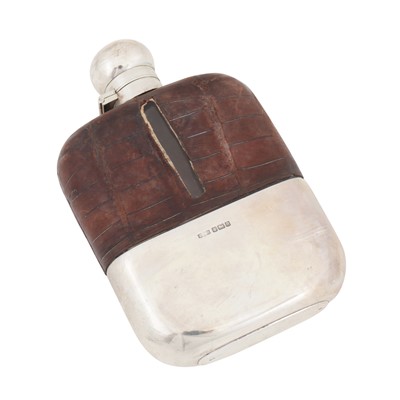 Lot 554 - An Edwardian sterling silver mounted spirit hip flask, Sheffield 1906 by James Dixon and Sons