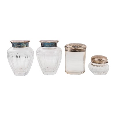 Lot 521 - A pair of Elizabeth II sterling silver mounted glass vases, London 1999 by Asprey and Garrard