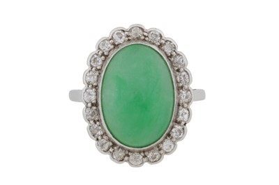Lot 87 - A jade and diamond cluster ring