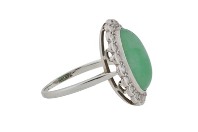 Lot 87 - A jade and diamond cluster ring