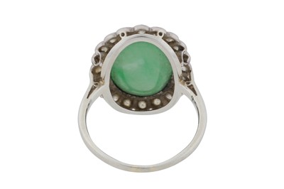 Lot 87 - A jade and diamond cluster ring