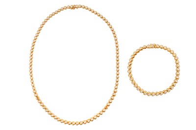 Lot 315 - A diamond heart necklace and bracelet suite